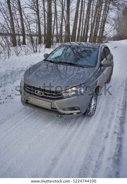 Voronezh,\
Russia-February 12, 2017: Russian budget car LADA VESTA on a\
snow-covered road                            \
