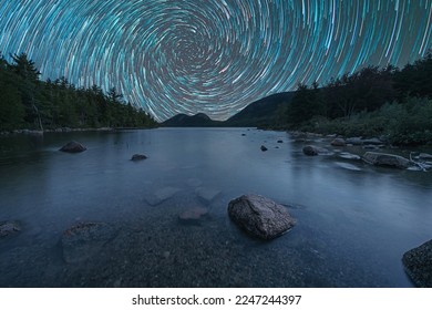 Vortex spiral star trails at Jordan Pond in Acadia National Park Maine  - Powered by Shutterstock