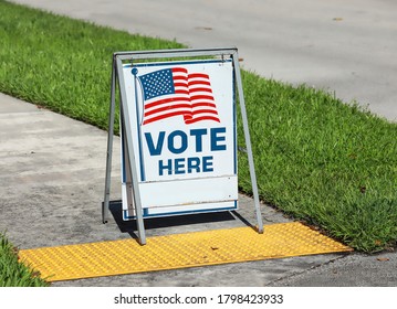 Vote Here Sign Placed On The Walkway To A Neighborhood Polling Place, As Seen On Election Day In Fort Lauderdale, Florida, USA