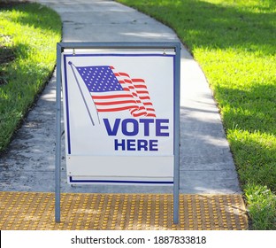 VOTE HERE SIGN Placed On The Walkway To A Neighborhood Polling Place, As Seen On Election Day In Fort Lauderdale, Florida, USA.