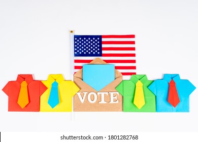 Vote In USA. Envelope With VOTE Logo And USA Flag. Vote For Candidate For US Presidency. Preparing For US Elections. Law On Voting Through Postal Service. Shirts Symbolize Presidential Candidates.