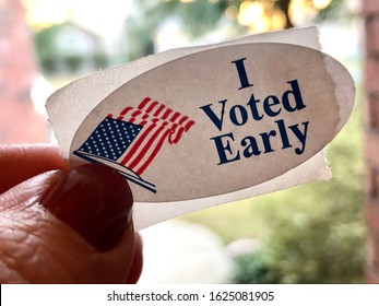 I Voted Early Sticker On A Middle Aged Woman’s Finger