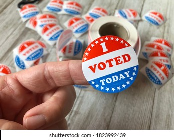 I Voted Sticker On A Woman’s Finger