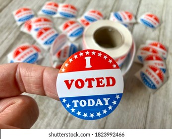 I Voted Sticker On A Woman’s Finger