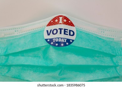 I Voted Sticker On Protective Face Mask. Concept Of Voting In The USA During Coronavirus Pandemic