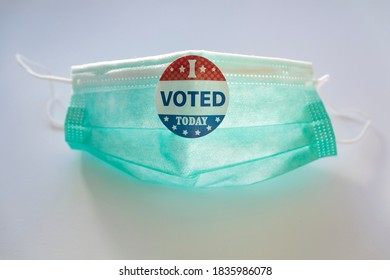 I Voted Sticker On Protective Face Mask. Voting In The USA During Coronavirus Pandemic