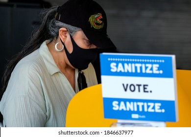 A Voter Casts Her Ballot At A Vote Center In Dodgers Stadium During The Election Day In Los Angeles, Tuesday, Nov. 3, 2020.