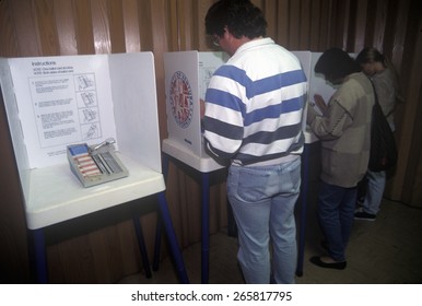 Voters And Voting Booths In A Polling Place, CA