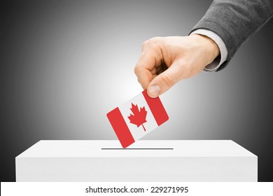 Voting concept - Male inserting flag into ballot box - Canada