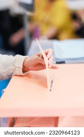 voting democracy background. Unrecognizable hispanic woman hand in candidate election referendum
