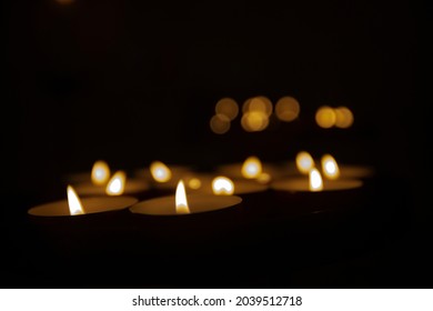 Votive Candles In Catholic Church As Memorial Or Vigil