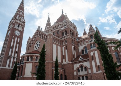 The Votive church and Cathedral of Our Lady of Hungary is a twin-spired church on the Dom Square in Szeged, Hungary. No people. - Powered by Shutterstock