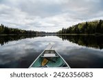 voyageurs national park canoe over flat calm water