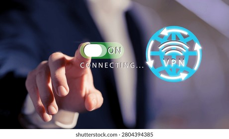 : VPN security concept with user activating secure connection on smartphone while working on laptop at home, showing mobile internet protection, encrypted data access, and online privacy