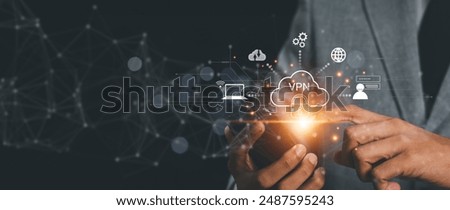 VPN Virtual private network concept. Man hand using Smartphone with vpn icon on VR screen. virtual private network channels a secure data connection between your local machine and another VPN server.