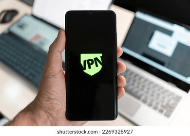 VPN - Virtual Private Network - Cyber Security and Privacy Data Encryption Software Solutions for Business concept. smartphone with vpn app for anonymous internet using, unblock websites