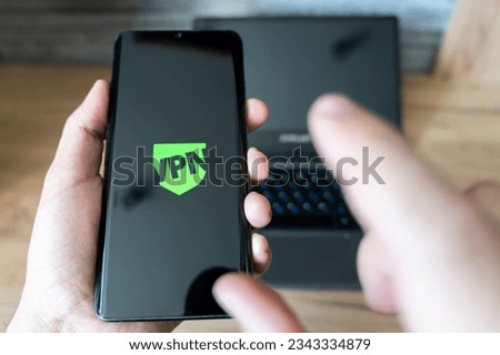 VPN - Virtual Private Network - Cyber Security and Privacy Data Encryption Software Solutions for Business concept. smartphone with vpn app for anonymous internet using, unblock websites