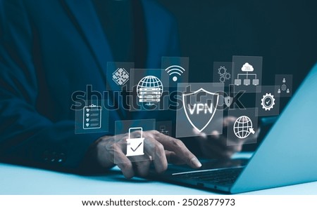 VPN, Virtual Private Network encryption connection concept. Businessman working on laptop, surrounded by digital security icons VPN shield, server, padlock, online security, and data protection.