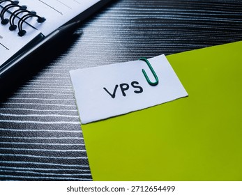 VPS writting on table background. 