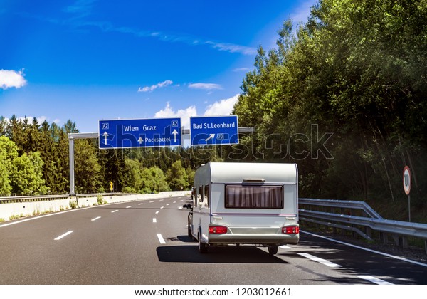 VR Caravan car travels on the highway. Tourism\
vacation and traveling.