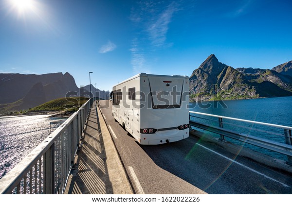 VR Caravan car\
travels on the highway. Tourism vacation and traveling. Beautiful\
Nature Norway natural\
landscape.