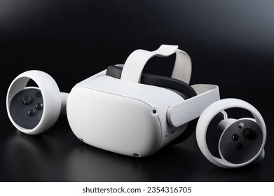 Vr kit wireless headset with joystick isolated on black studio background