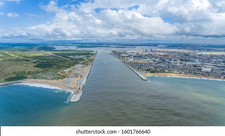
The Vridi Canal, in Abidjan in Côte d'Ivoire, for navigation, the Autonomous Port of Abidjan - Shutterstock ID 1601766640