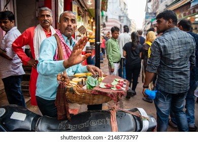 Vrindavan, Uttar Pradesh, India- April 9 2022: Paan seller selling Paan in a local market in Vrindavan, A holy town in northern India.  Paan Vendor on street.