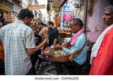 Vrindavan, Uttar Pradesh, India- April 9 2022: Paan seller selling Paan in a local market in Vrindavan, A holy town in northern India.  Paan Vendor on street.