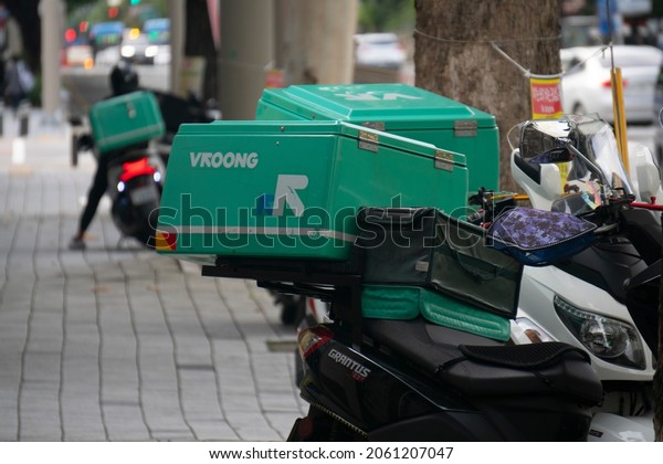 Vroong delivery motorcycles waiting\
for Food delivery orders. (Daegu, Korea. Oct. 13,\
2021)