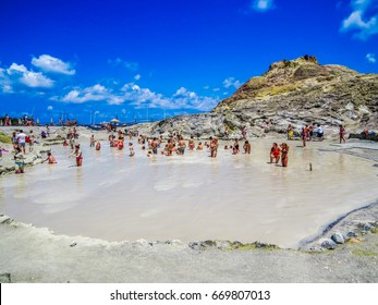 VULCANO, ITALY - JULY 16, 2014 - Unidentified People Having A Mud And Sulfur Bath On The Volcanic Island. 