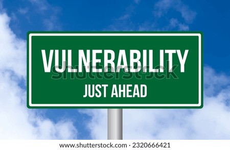 Vulnerability just ahead road sign on blue sky background
