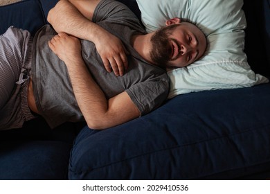 Vulnerable, Scared, Depressed, Traumatized Adult Man Finding News That Makes To Fall Into Mental Suicidal State, Crying And Feeling Unhappy, Lonely , Desperate Suffering From Physical Disorder