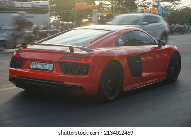 Vung Tau city, Vietnam - March 2022: Audi R8 and other supercars on the road of the city.