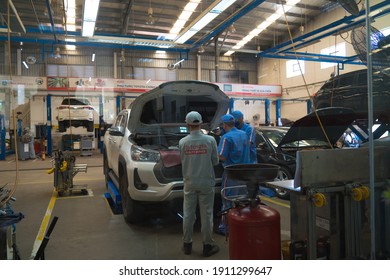 Vung Tau, VIETNAM - JAN 6 2021: Automotive suspension test and brake test rolls in a auto repair service.interior garage industry concept.