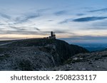 Vysoka plan hill summit above Snezne jamy in Krkonose mountains on czech - polish borders during summer dusk