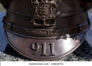 W. ORANGE, NJ-SEPT 11: A bronze sculpture of a policeman's hat in the 911 memorial inside Eagle Rock Reservation honors victims of the 2001 terror attacks on September 11, 2012 in West Orange, NJ.