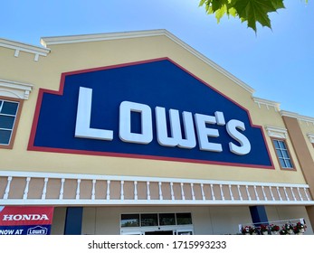 W. Sac, CA - April 26, 2020: Closeup Of Lowe’s Home Improvement Storefront On A Busy Day, Which Remains Open Even During The Covid 19 Pandemic.