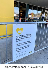 W Sac, CA - November 30, 2020: CDC Social Distancing Guidelines And Precautions In Front Of IKEA Entrance. 