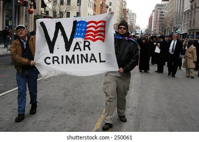 W: War Criminal Protest Sign Regarding Bush And Iraq. From The Inauguration Of George W. Bush.