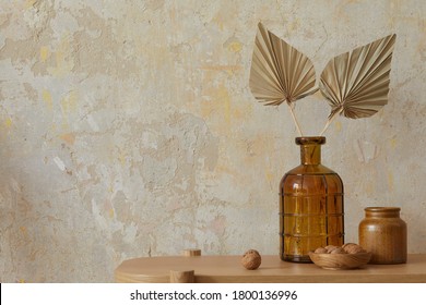 Wabi Sabi Interior Of Living Room With Wooden Console, Paper Flowers In Vase, Nuts And Copy Space. Minimalistic Concept. 