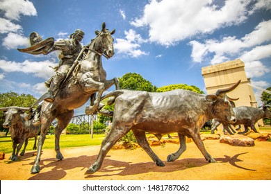 Waco, Texas, USA-26 May 2019-The Waco Cattle Drive, by Artist Robert Summers consists of 28 bronze sculptures that are life-size and a half depicting cowboys herding longhorn cattle