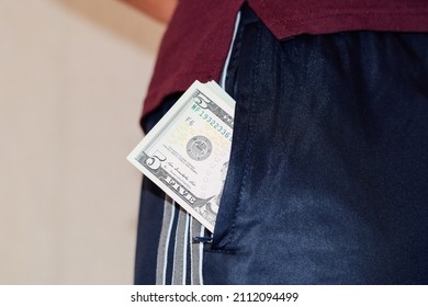 A Wad Of Money In The Pocket Of A Man's Pants. Dollars In Your Pocket.