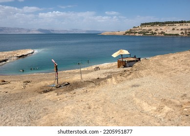 Wadi Mujib, Dead Sea, Jordan : 21 September 2022 : A Beach On The Dead Sea With Free Swimming And A Small Business Set Up By Locals Offering Showers, Changing Room And Other Amenities