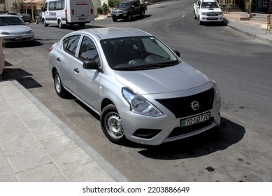 Wadi Musa, Jordan : 19 September 2022 : A Nissan Sunny Saloon Car Parked