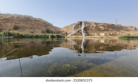 Wadi Namar Waterfall in Riyadh, Saudi Arabia. It is a popular destination for families and tourists - Powered by Shutterstock