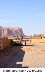 Wadi Rum Desert, Jordan -August 06 2013: Children Playing At Street Next To Wadi Rum Dessert.