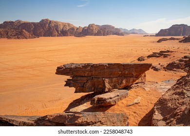 Wadi Rum desert in Jordan. Red Mars landscape, red sand and rocky mountains. Wild nature. 