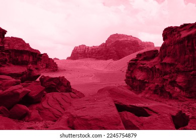 Wadi Rum desert, Jordan. The Valley of the Moon.  Abstract pattern. Image toned in the color of the year 2023 viva magenta. Mysterious cosmic landscape, virtual reality. - Shutterstock ID 2245754879