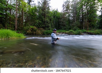 Wading In The Cedar River While Fly Fishing